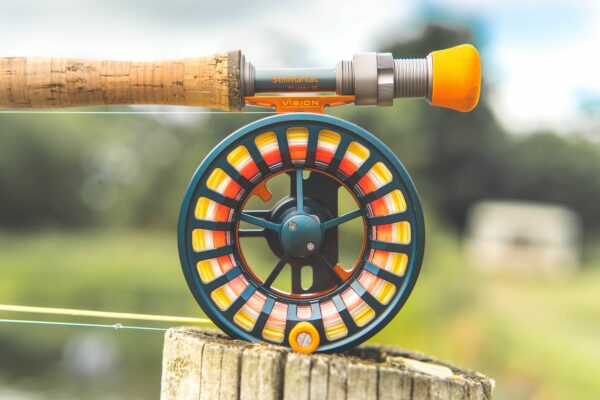 A trout sized cassette fly reel loaded with line and ready to fish